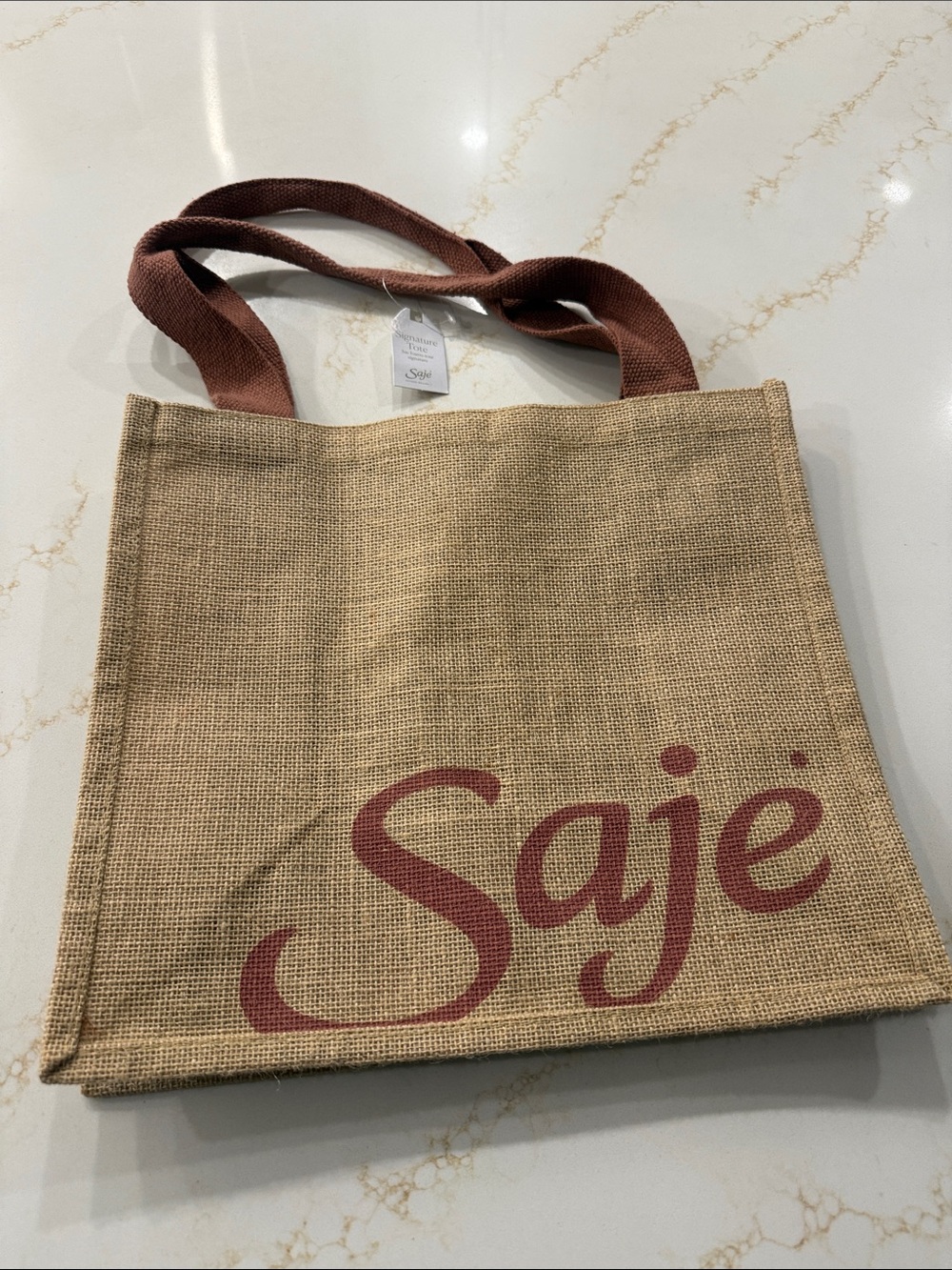 Saje Tan Jute Tote with Rust Handles and Logo